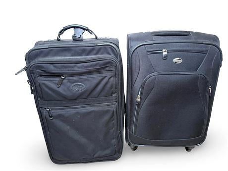 Two Large Rolling Suitcases