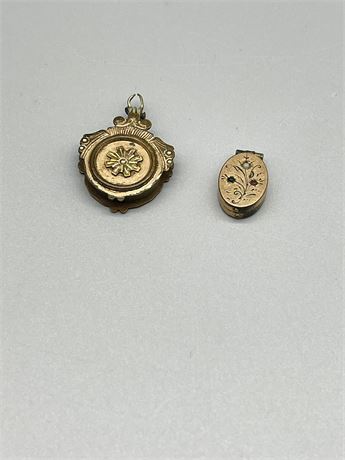 Two (2) Small Lockets