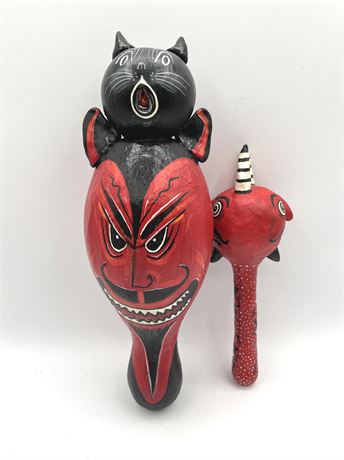 Folk Art Devil Shakers (both signed)