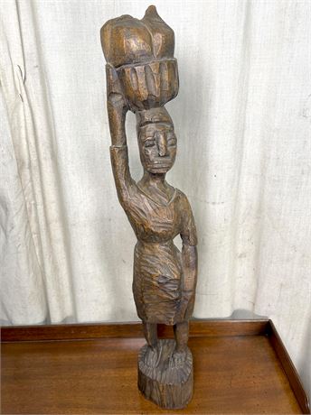 Hand Carved Woman Carrying a Basket