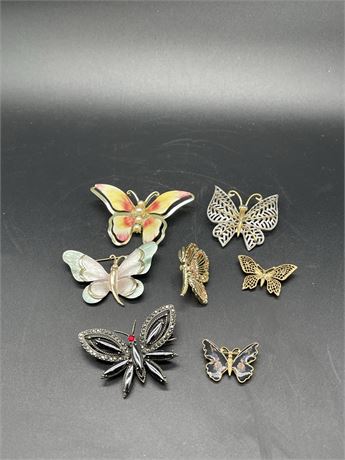 Seven (7) Butterfly Pins