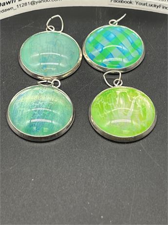 Four (4) Glass Pendants