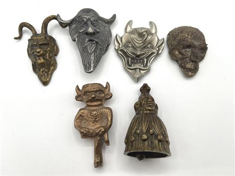 Metal Figural Faces and Bell