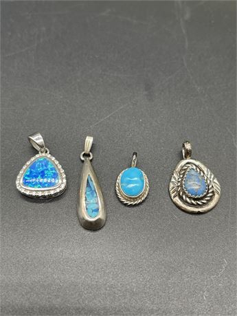 Four (4) Sterling Silve Pendants with Stones