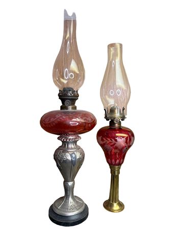 Two (2) Cranberry Glass Kerosene Oil Lamps