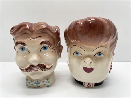 Man and Woman Head Vases