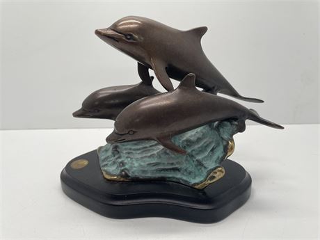 San Pacific International Bronze Dolphins
