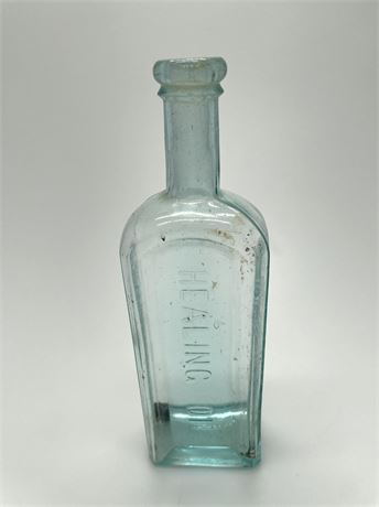 Antique Aqua Healing Oil Embossed Bottle