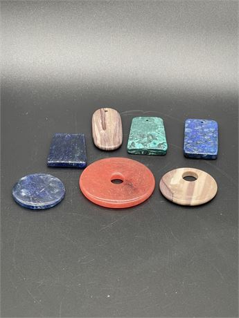 Seven (7) Polished Gem Stone Pendants