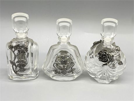 Sete of Three (3) Perfume Bottles
