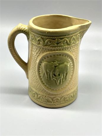 Yellow Ware Pitcher with Cows