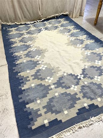 115" x 78" Woven Area Rug