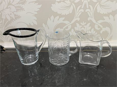 Three (3) Glass Pitchers