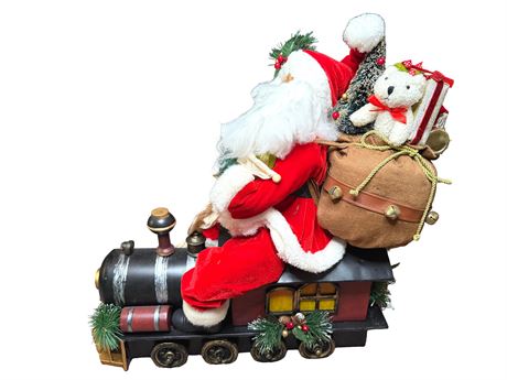 22" Tall Santa Riding a Metal Rolling Train