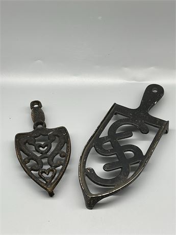 Small And Large Iron Trivets