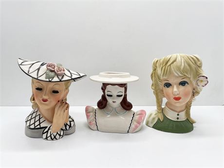 Three (3) Lady Head Vases