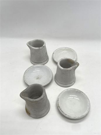 Creamers and Plates