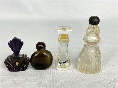 Four (4) Perfume Bottles