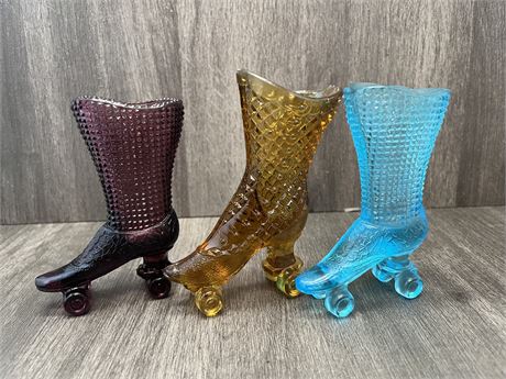 Two (2) Fenton Glass Rollerskates and One (1) Antique Glass Rollerskate