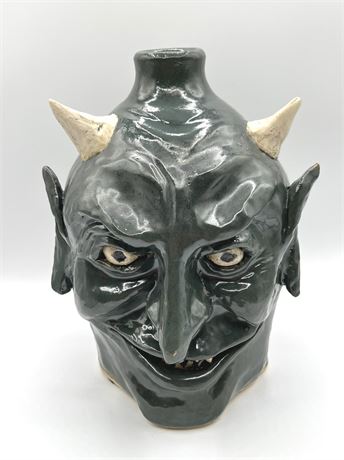 Signed Devil Horned Face Whiskey Jug